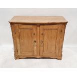 Victorian pine cupboard, the shaped top with two cupboard doors enclosing shelves, on bracket