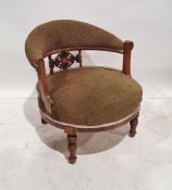 Victorian rosewood-framed armchair with brown upholstered seat and back, turned ring front legs