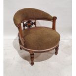 Victorian rosewood-framed armchair with brown upholstered seat and back, turned ring front legs