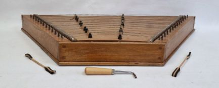 Elm based hammer dulcimer of trapezoidal form (106 x 11 x 44 cm) with two hammers and a tuner