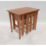 In the manner of Paul Hundevad mid-century modern teak nesting coffee tables