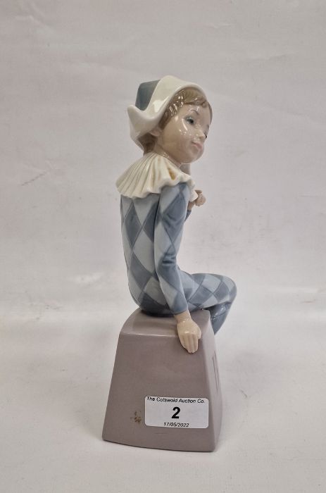 Lladro figure of boy wearing harlequin suit seated on box initialled B, 20.5cm high - Image 4 of 6