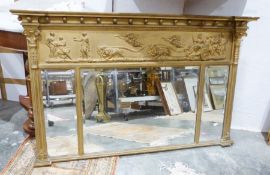 Regency-style overmantel mirror, the moulded corni