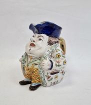 French faience Toby style jug, portly gentleman wearing floral jacket, striped waistcoat, probably