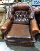 Brown leather armchair