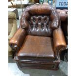 Brown leather armchair