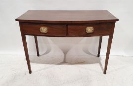 20th century mahogany bowfront two-drawer side table on square section tapering supports, 76cm x