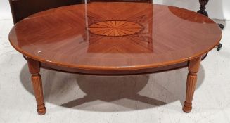 20th century oval coffee table on turned and carved supports, 41cm x 113cm x 70cm