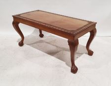 Eastern-style rectangular coffee table with carved decoration to the top, on cabriole legs