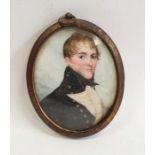 Miniature on ivory,  Head and shoulders of early nineteenth century gentleman in military coat 5.5 x