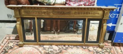 Regency-style three-part overmantel mirror, the cornice with ball decoration over the rose moulded