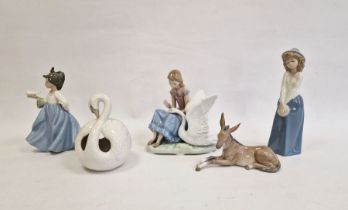 Nao girl with swan, two Nao figures of girls,  Lladro figure of a donkey and a Lladro swan pot
