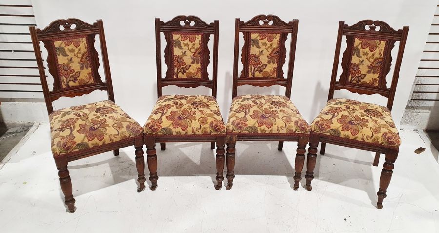 Set of four Edwardian dining chairs with upholstered seats and backs, on turned front legs (4)