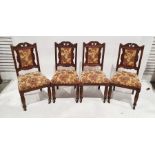 Set of four Edwardian dining chairs with upholstered seats and backs, on turned front legs (4)