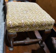 Early Georgian-style oak footstool with upholstered seat above carved oak support, on pad feet,