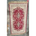 Modern silk cream ground rug with two floral medalions with floral border 146cm x 79cm