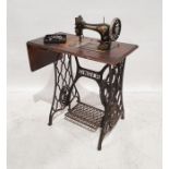 Singer sewing machine on treadle base, no.B123191