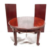 20th century mahogany extending D-end table with moulded edge, on turned supports to pad feet,