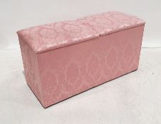 Pink upholstered ottoman