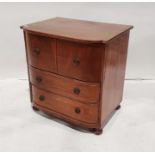 19th century converted mahogany commode with bowfront over three drawers, on bun feet, 68cm x 71cm