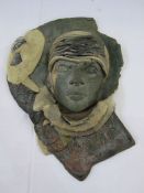 Joanna Drummond ceramic wall decoration depicting the head of 'Dyaus' (the Hindu God of the sky) ,