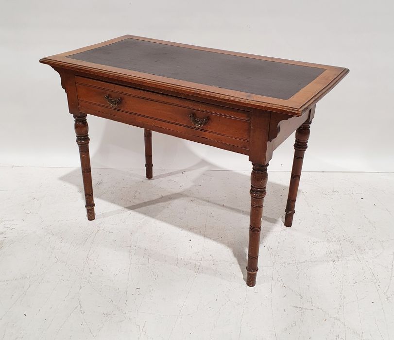 Early 20th century single drawer leather topped low side table with turned supports