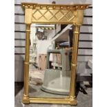 19th century century-style pier glass mirror with gold-coloured frame with ball decoration,