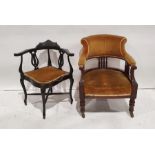 Late Victorian armchair with yellow upholstered back and seat, on front legs to brown china