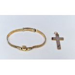Gold-coloured metal cross pendant, 4.3g approx. and a rolled gold bangle (2)