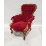 Victorian armchair with red upholstered seat, back and arms, on cabriole front legs to white china