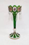 Bohemian overlay glass lustre with green trumpet-shaped bowl and scalloped top, bearing