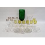 Set of five knopped wine glasses with gilt decoration, a set of seven sherry glasses with yellow