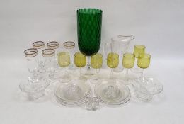 Set of five knopped wine glasses with gilt decoration, a set of seven sherry glasses with yellow