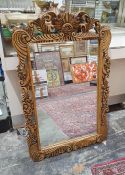 20th century mirror with rectangular plate, in carved moulded frame