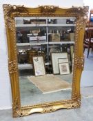 Rectangular mirror with moulded gilt finished frame, 78.5cm high x 109cm wide x 6.5cm deep