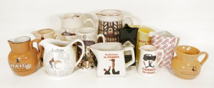 Large collection of assorted advertising jugs to include Famous Grouse Whisky, Guinness, Bells