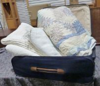 Two vintage quilts, a bedspread and a suitcase