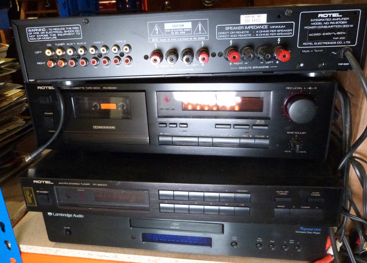Rotel RA-9708X amplifier, a Rotel RD-960BX stereo cassette tape deck, a Rotel RT940AX AM/FM stereo