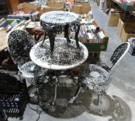 Metal garden table and chairs with pierced decoration