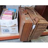 Wicker picnic hamper, a leather briefcase and a collection of Ordnance Survey maps