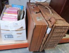 Wicker picnic hamper, a leather briefcase and a collection of Ordnance Survey maps