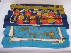 Hermès scarves to include ‘P. Peron’ blue red and gold chess design and Maillons 1973 blue and