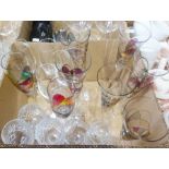 Set of six large wine glasses, a set of six champagne flutes, two ceramic models of elephants and