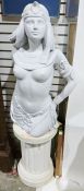 Modern white painted terracotta sculpture of a scantily clad female wearing Egyptian garments, on
