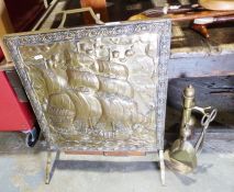 Brass fireside companion set and a brass firescreen with embossed image of a galleon