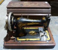 Singer sewing machine, model no.15686302 with wooden case