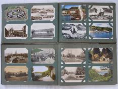 Two albums of vintage postcards, topographical and other and a quantity of loose similar