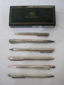 Dunhill silver-coloured metal pen, a Caran D'Ache silver-coloured metal pen, a Montegrappa silver