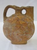 Egyptian pottery flask, disc-shaped, with pierced curved handle, geometric painted decoration