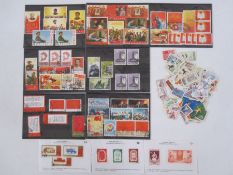 China: Accumulation of mostly used PRC defin. & commem. on 7 stock-cards plus 3 priced sheets &